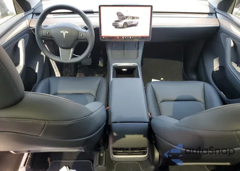 2024 Tesla Model Y from USA, damaged, VIN 7SAYGDEE1RA328570